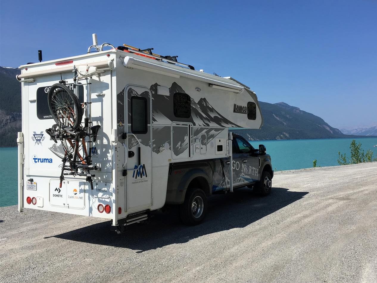 Truck camper at Muncho Lake, British Columbia