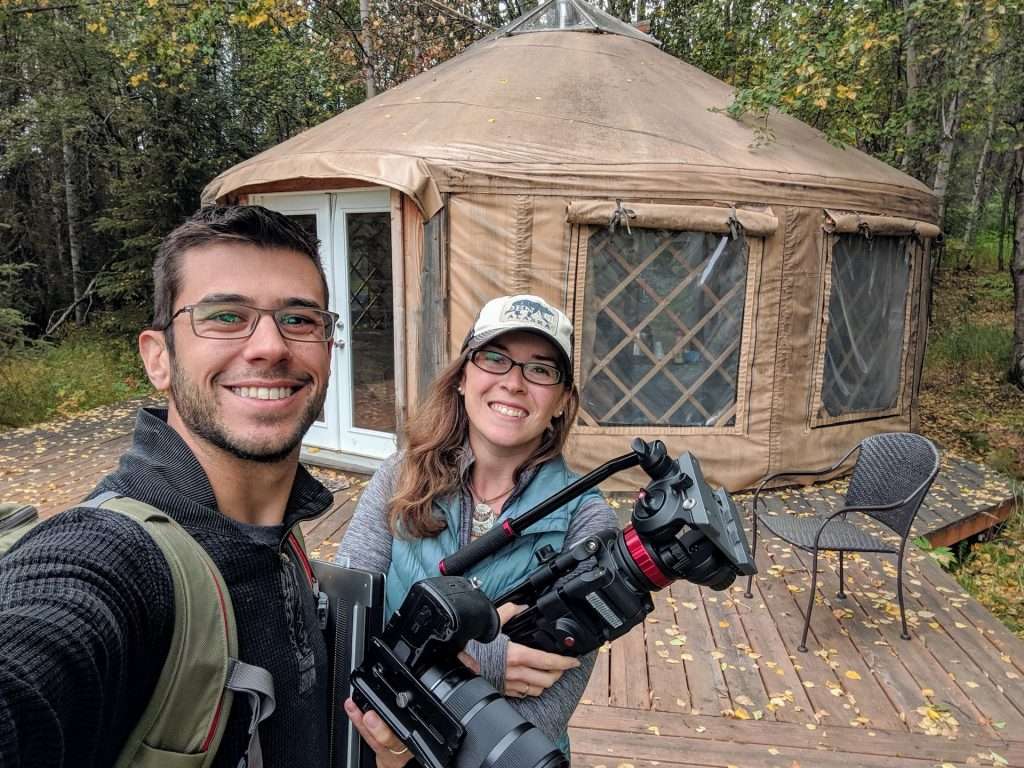 Tom and Caitlin Morton in front of a yurt