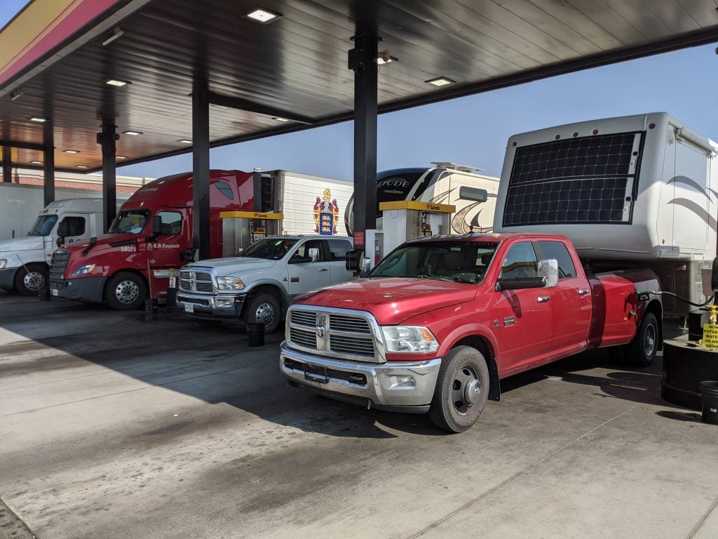 Dually truck filling at truck stop