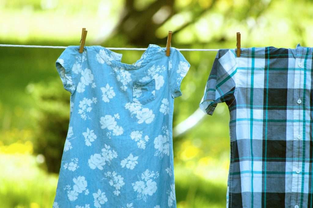 how to get campfire smell out of clothes. hang laundry in sunlight