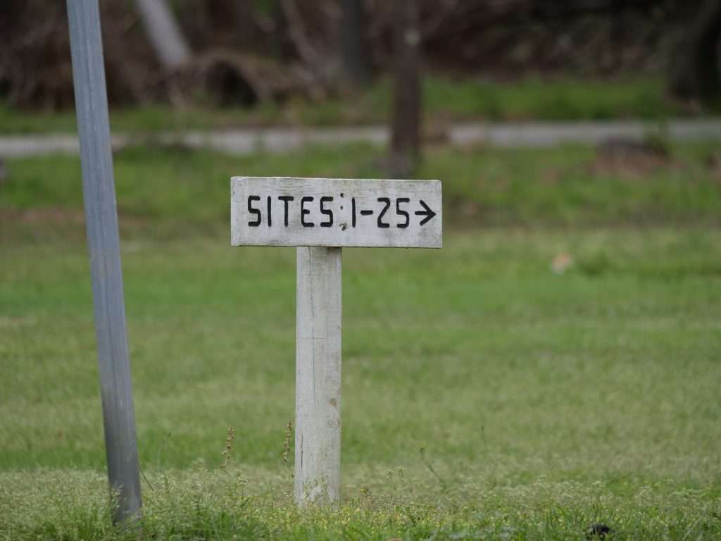 sites 1-25 camping sites sign