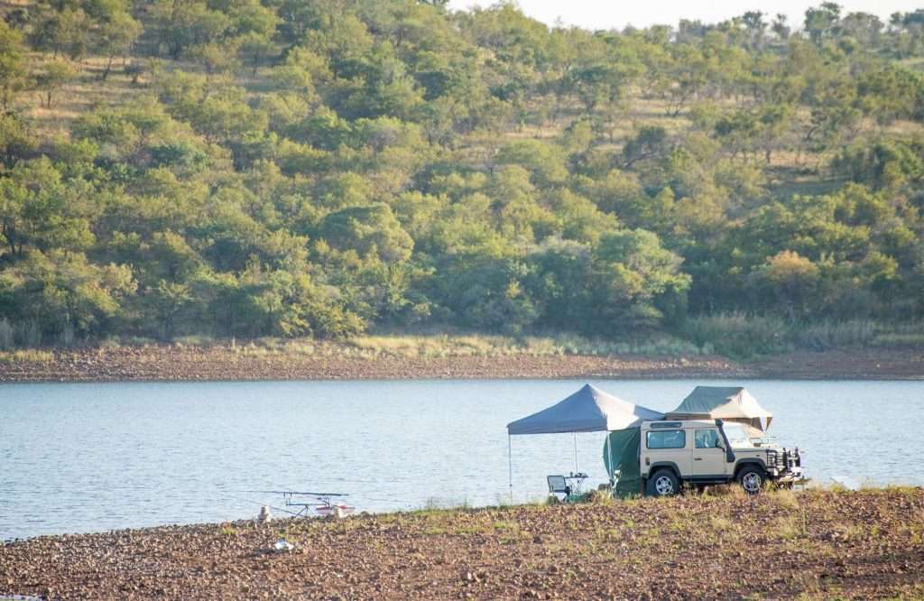 suv tent camping by lake