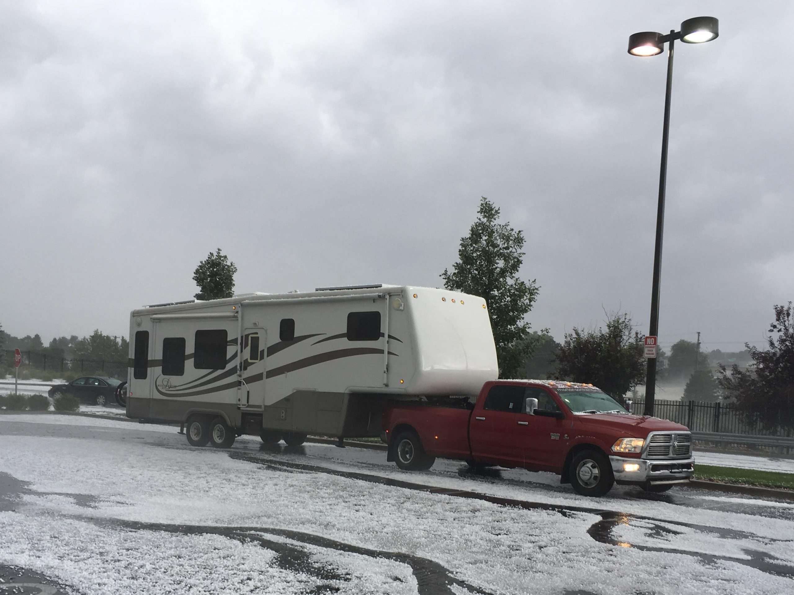 RV towing in the snow.